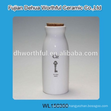 White ceramic bottle with cork